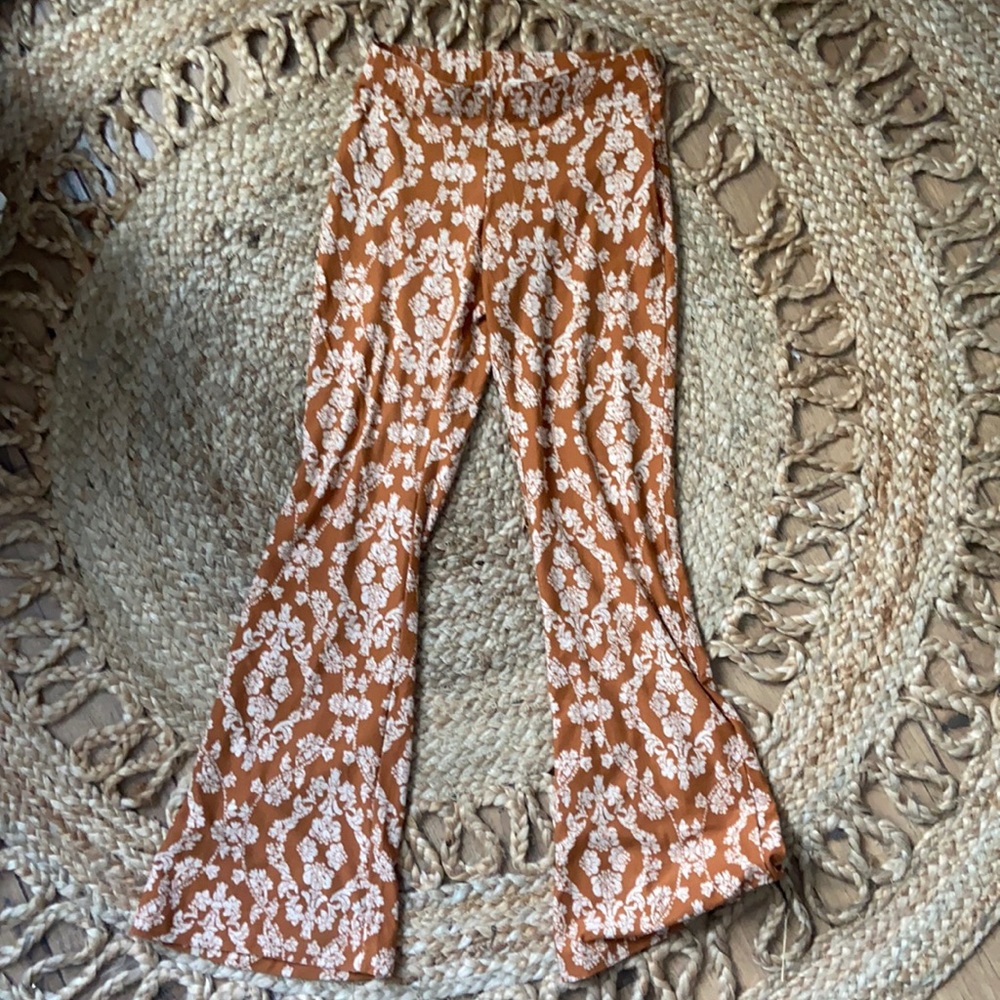 Rust orange flare pants